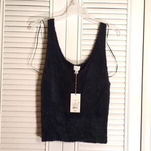 Women's V-Neck fuzzy sweater tank.